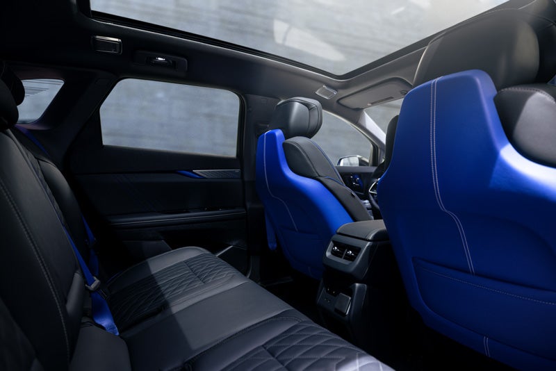 Back Seat View of the 2026 OPTIQ-V Blue Front Seats, Sun Roof, and Interior | Joe Cooper Cadillac of Shawnee in Shawnee OK